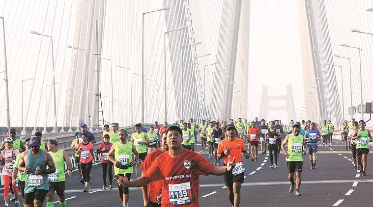 Marathon event near a sea view hotel on Marine Drive, Mumbai, where participants enjoy a scenic route along the mesmerizing coastline