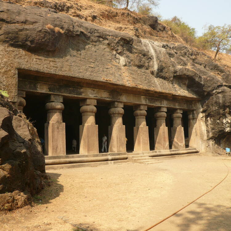 Historic Elephanta Caves, a UNESCO World Heritage Site near sea-facing hotels in Mumbai, showcasing ancient sculptures and captivating sea vistas