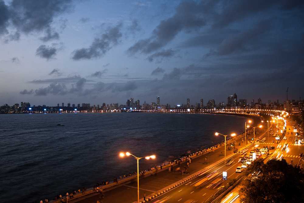 Marine Drive, a captivating promenade near Mumbai sea view hotels, offering a scenic coastal walk and mesmerizing views of the Arabian Sea 