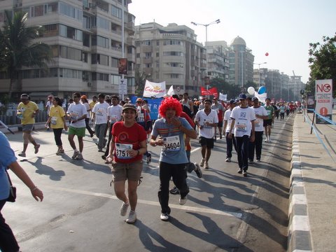 Marathon event near a Mumbai sea view hotel, with participants running along the scenic coastal route, energized by the refreshing sea breeze