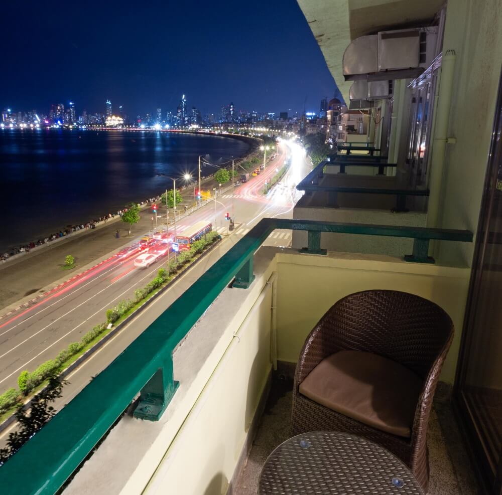 Stunning sea view from a luxurious hotel room in Mumbai, featuring elegant decor and a serene ambiance